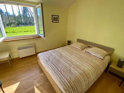 Un ou plusieurs lits dans un hébergement de l'établissement Maison à la Campagne à Melgven