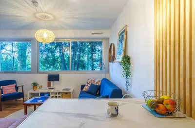 Un ou plusieurs lits dans un hébergement de l'établissement La Cabine Bleue - A 30 mètres de la plage