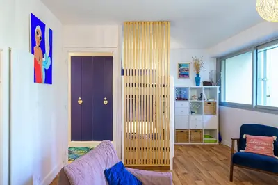 Un ou plusieurs lits dans un hébergement de l'établissement La Cabine Bleue - A 30 mètres de la plage