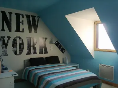 Un ou plusieurs lits dans un hébergement de l'établissement Maison et Plage de Sable Fin