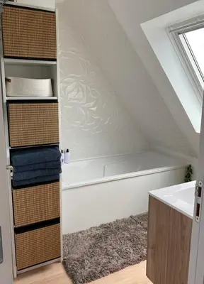 Un ou plusieurs lits dans un hébergement de l'établissement Charmante maison proche de la mer et des commerces