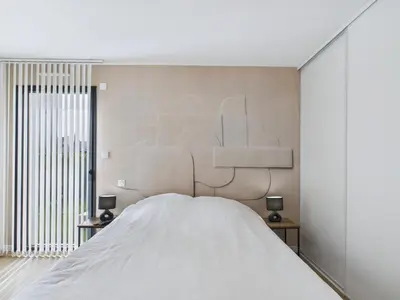 Un ou plusieurs lits dans un hébergement de l'établissement Maison moderne pour 8 à 400m de la plage