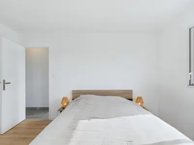 Un ou plusieurs lits dans un hébergement de l'établissement Maison moderne pour 8 à 400m de la plage