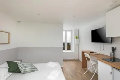 Télévision ou salle de divertissement dans l'établissement L'Ankou