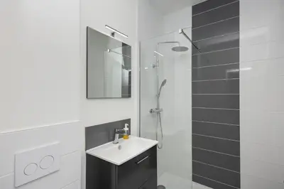 Salle de bains dans l'établissement Le Triomphant
