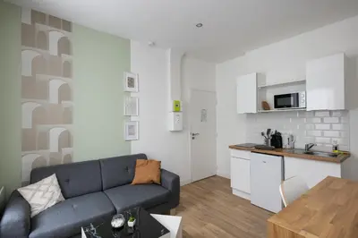 Cuisine ou kitchenette dans l'établissement Le Triomphant