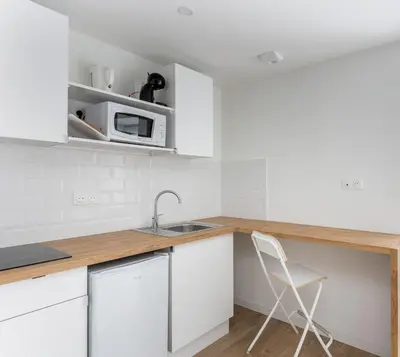 Cuisine ou kitchenette dans l'établissement Dame Blanche