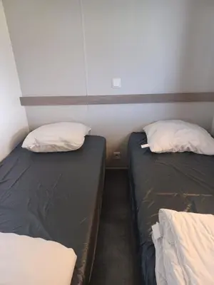 Un ou plusieurs lits dans un hébergement de l'établissement Bora Bora