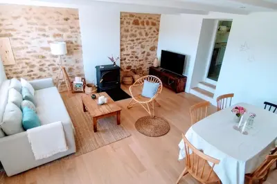 Coin salon dans l'établissement Maison avec vue mer à Saint-Pol-de-Léon