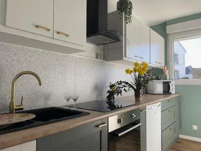 Cuisine ou kitchenette dans l'établissement Le Vieux Port - Vue mer
