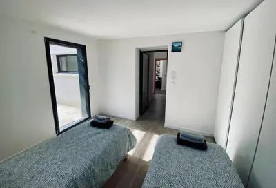Un ou plusieurs lits dans un hébergement de l'établissement Carantec Golf - Villa Shibumi