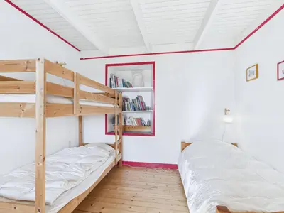 Un ou plusieurs lits dans un hébergement de l'établissement À 400m de la plage, charmante maison pour 7