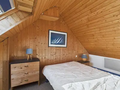 Un ou plusieurs lits dans un hébergement de l'établissement À 400m de la plage, charmante maison pour 7