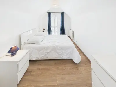 Un ou plusieurs lits dans un hébergement de l'établissement Maison avec veranda pour 6 personnes