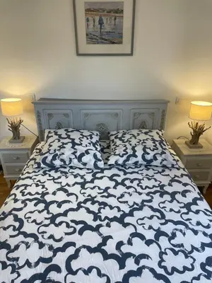 Un ou plusieurs lits dans un hébergement de l'établissement Chaleureux appartement sur Brest