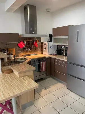 Cuisine ou kitchenette dans l'établissement Chaleureux appartement sur Brest