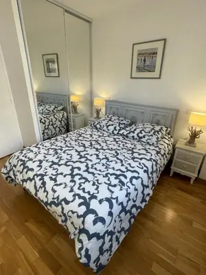 Un ou plusieurs lits dans un hébergement de l'établissement Chaleureux appartement sur Brest