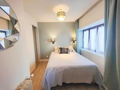 Un ou plusieurs lits dans un hébergement de l'établissement Le studio - La maison de la côte des légendes