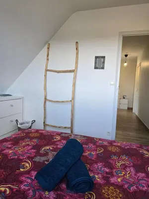 Un ou plusieurs lits dans un hébergement de l'établissement Les chambres de la Vallée Cachée