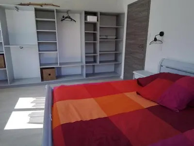 Un ou plusieurs lits dans un hébergement de l'établissement Jolie petite maison à 7 min à pied de la plage pour 6 pers