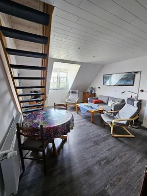 Coin salon dans l'établissement Bretagne FeWo Hortensia für 2 Personen, no Kids