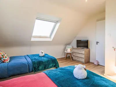 Télévision ou salle de divertissement dans l'établissement Holiday Home La Maison de Parrain by Interhome