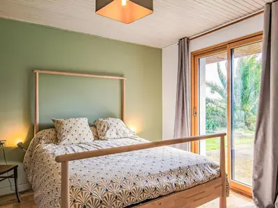 Un ou plusieurs lits dans un hébergement de l'établissement Holiday Home Feliz Breizh by Interhome