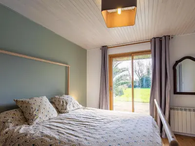 Un ou plusieurs lits dans un hébergement de l'établissement Holiday Home Feliz Breizh by Interhome