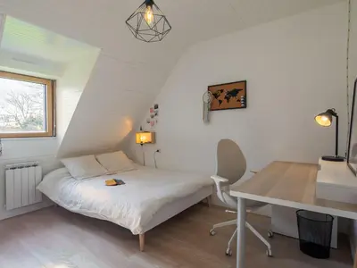 Un ou plusieurs lits dans un hébergement de l'établissement Holiday Home Feliz Breizh by Interhome