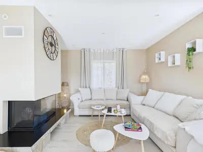 Coin salon dans l'établissement Maison familiale 7 personnes à 150m de la mer
