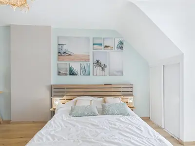 Un ou plusieurs lits dans un hébergement de l'établissement Maison familiale 7 personnes à 150m de la mer