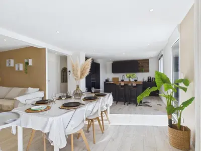 Coin salon dans l'établissement Maison familiale 7 personnes à 150m de la mer