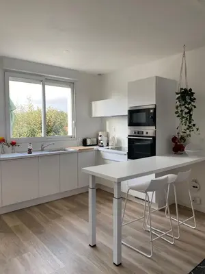 Cuisine ou kitchenette dans l'établissement La maison de Marie