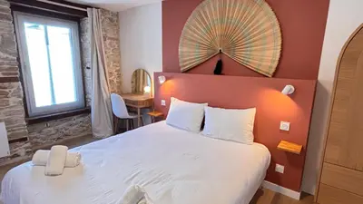 Un ou plusieurs lits dans un hébergement de l'établissement Romance & Evasion - Centre Ville - Love Room - Balnéo