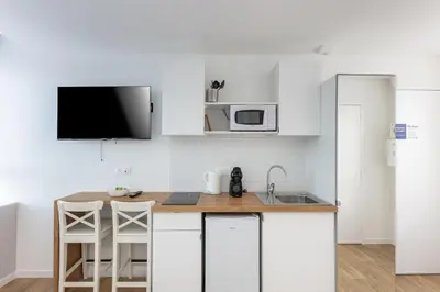 Cuisine ou kitchenette dans l'établissement Excalibur