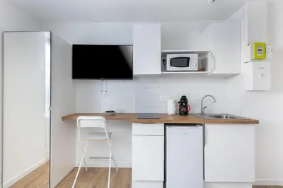 Cuisine ou kitchenette dans l'établissement Fée Morgane