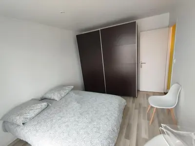 Un ou plusieurs lits dans un hébergement de l'établissement Appartement 3 chambres