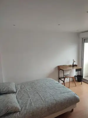 Un ou plusieurs lits dans un hébergement de l'établissement Appartement 3 chambres