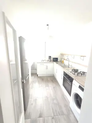 Cuisine ou kitchenette dans l'établissement Appartement 3 chambres