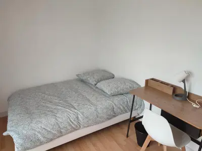 Un ou plusieurs lits dans un hébergement de l'établissement Appartement 3 chambres