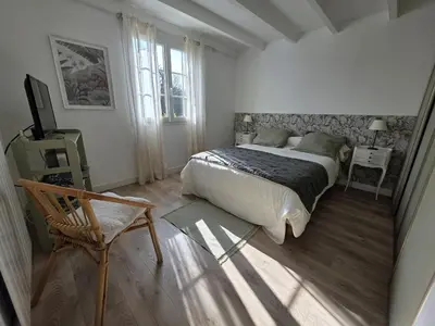 Un ou plusieurs lits dans un hébergement de l'établissement Charmante maison bretonne 400 m des plus belles plages