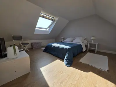 Un ou plusieurs lits dans un hébergement de l'établissement Charmante maison bretonne 400 m des plus belles plages