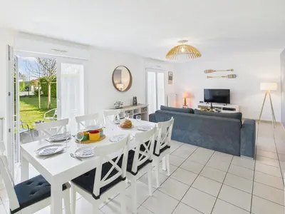 Coin salon dans l'établissement Maison familiale pour 7 proche de la mer