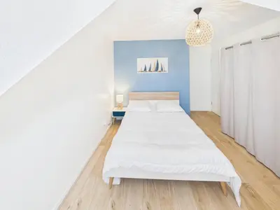 Un ou plusieurs lits dans un hébergement de l'établissement Maison familiale pour 7 proche de la mer