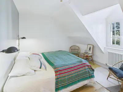 Un ou plusieurs lits dans un hébergement de l'établissement Maison pour 8 - Piscine chauffée - 800m de la plage