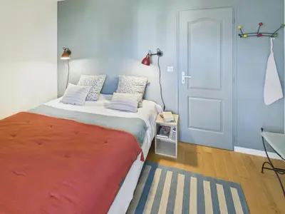 Un ou plusieurs lits dans un hébergement de l'établissement Maison pour 8 - Piscine chauffée - 800m de la plage