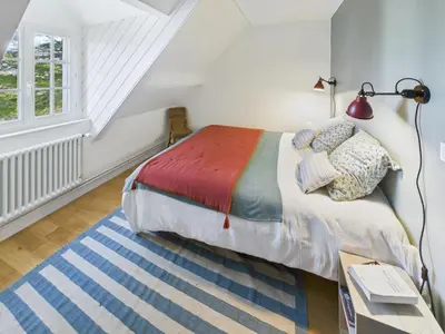 Un ou plusieurs lits dans un hébergement de l'établissement Maison pour 8 - Piscine chauffée - 800m de la plage