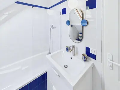 Salle de bains dans l'établissement Maison pour 8 - Piscine chauffée - 800m de la plage