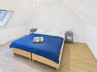 Un ou plusieurs lits dans un hébergement de l'établissement Maison pour 8 avec terrasse - Kerity