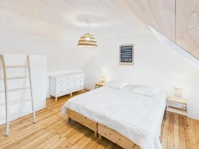 Un ou plusieurs lits dans un hébergement de l'établissement Maison pour 8 avec terrasse - Kerity